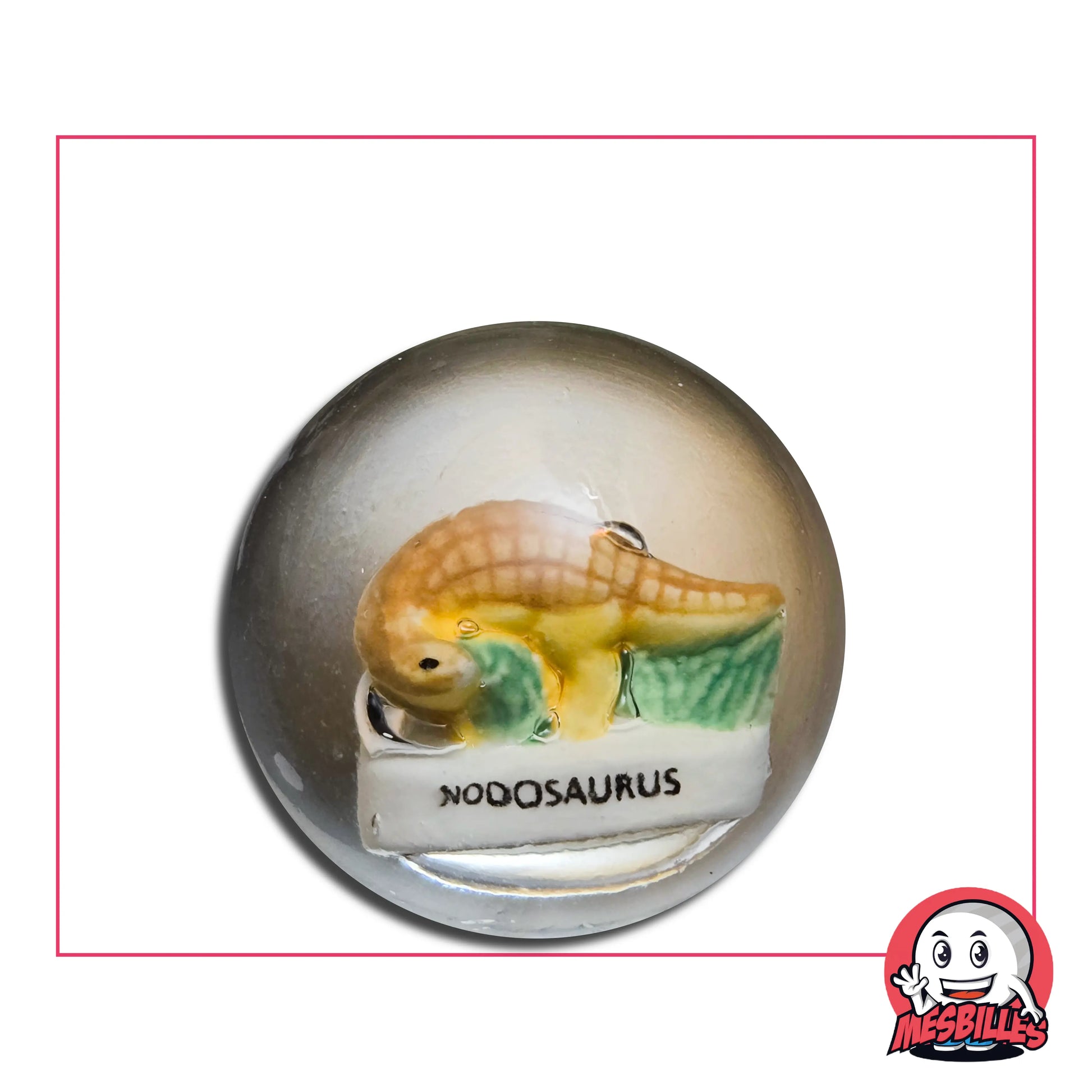 Bille Incrustation Nodosaurus 35 mm – dinosaure miniature orange et jaune dans une bille transparente